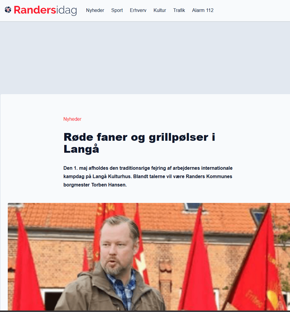 Røde faner og grillpølser i Langå